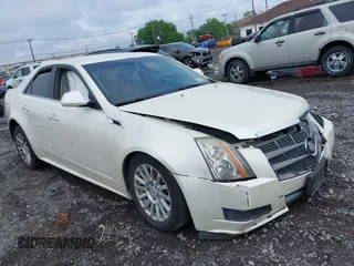2011 Cadillac CTS with VIN 1G6DC5EY0B0130256, listed as a IAAI auction lot 42451461 with 96,175 mi miles and . Bid and sale history available at DreamBid. Image 1.