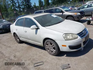 2007 Volkswagen Jetta 2.5 z VIN 3VWSF71K97M031591, wystawiony jako IAAI lot #42375346 z przebiegiem 207 594 mil mil oraz . Historia ofert i sprzedaży dostępna na DreamBid. Obrazek 1.