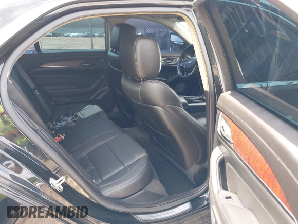 2016 Cadillac CTS AWD with VIN 1G6AW5SX7G0129019, listed as a IAAI auction lot 42148335 with 86,023 mi miles and . Bid and sale history available at DreamBid. Image 8.