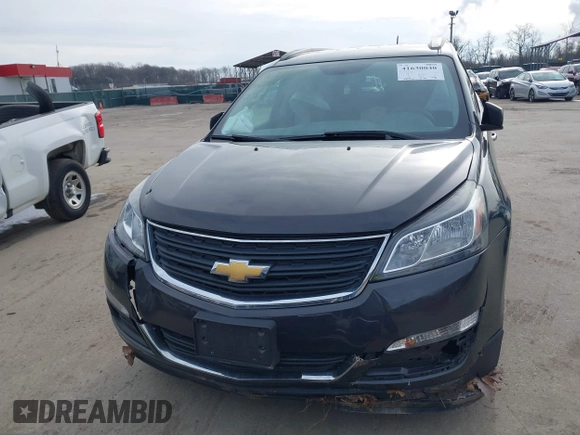 2017 Chevrolet Traverse LS z VIN 1GNKVFKD4HJ142765, wystawiony jako IAAI lot #41630040 z przebiegiem 82 986 mil mil oraz . Historia ofert i sprzedaży dostępna na DreamBid. Obrazek 12.