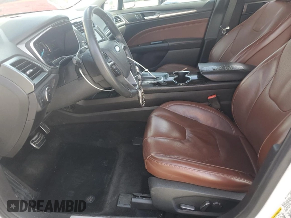 2016 Ford Fusion Titanium Hybrid with VIN 3FA6P0RU3GR144704, listed as a Copart auction lot 51850175 with 148,890 mi miles and Salvage Title. Bid and sale history available at carsss.com. Image 7.