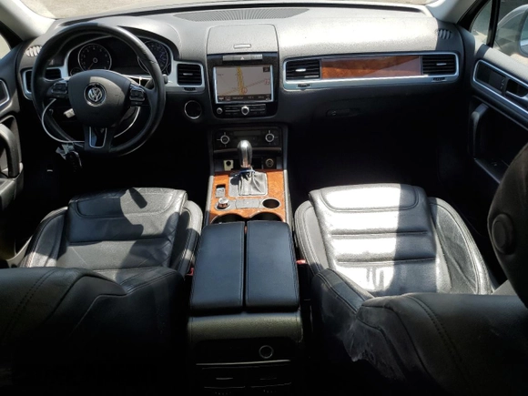 2012 Volkswagen Touareg Sport with VIN WVGEF9BP0CD010197, listed as a Copart auction lot 48480355 with 131,605 mi miles and Salvage Title. Bid and sale history available at DreamBid. Image 8.