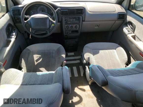 1999 Chevrolet Venture z VIN 1GNDX03E9XD195238, wystawiony jako Copart lot #74138994 z przebiegiem 140 283 mil mil oraz Szkoda całkowita • Salvage title. Historia ofert i sprzedaży dostępna na DreamBid. Obrazek 8.