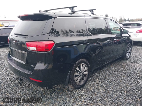 2016 Kia Sedona EX with VIN KNDMC5C11G6160910, listed as a IAAI auction lot 40905404 with 105,523 mi miles. Bid and sale history available at carsss.com. Image 4.