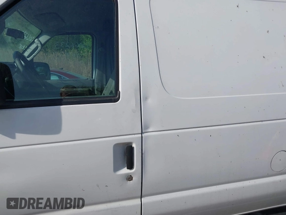 2009 Ford Econoline Cargo with VIN 1FTNE24W89DA31505, listed as a IAAI auction lot 42066233 with 267,327 mi miles. Bid and sale history available at carsss.com. Image 14.