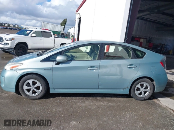 2013 Toyota Prius One with VIN JTDKN3DU6D5557058, listed as a IAAI auction lot 41765281 with 118,128 mi miles. Bid and sale history available at carsss.com. Image 13.