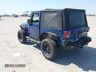 2010 Jeep Wrangler Sport with VIN 1J4AA2D11AL117404, listed as a IAAI auction lot 42012340 with 266,310 mi miles and . Bid and sale history available at carsss.com. Image 3.