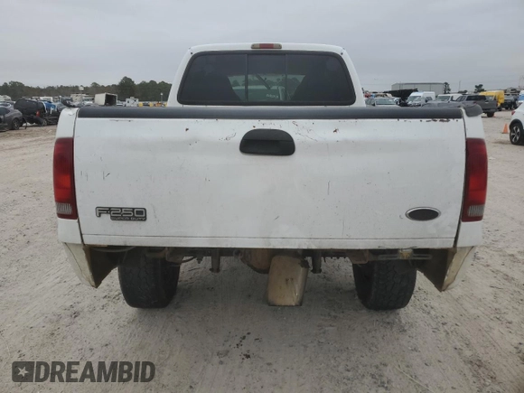 1999 Ford Super Duty F-250 XL with VIN 1FTNW21F9XEE54604, listed as a Copart auction lot 84541084 with 387,128 mi miles and Salvage Title. Bid and sale history available at carsss.com. Image 6.