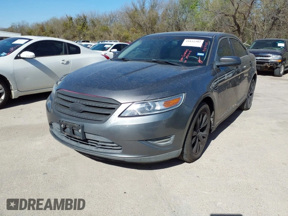 2011 Ford Taurus SEL with VIN 1FAHP2EW4BG183541, listed as a IAAI auction lot 41832302 with 185,085 mi miles. Bid and sale history available at carsss.com. Image 2.