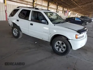 2000 Isuzu Rodeo S z VIN 4S2CK58W3Y4323965, wystawiony jako Copart lot #61189435 z przebiegiem 211 726 mil mil oraz Szkoda całkowita • Salvage title. Historia ofert i sprzedaży dostępna na DreamBid. Obrazek 4.