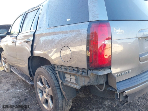 2019 Chevrolet Tahoe LT with VIN 1GNSCBKC8KR123828, listed as a IAAI auction lot 41256573 with 125,618 mi miles. Bid and sale history available at carsss.com. Image 6.