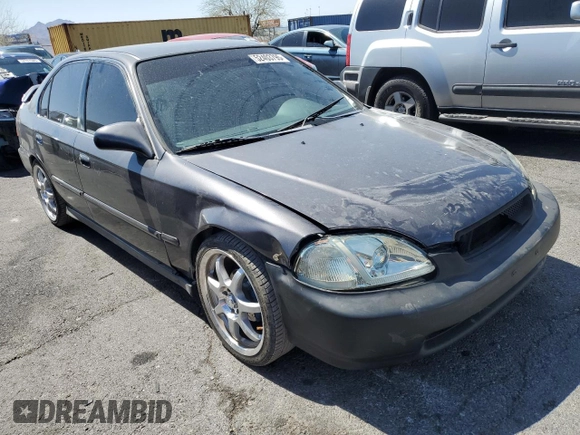 1998 Honda Civic LX with VIN 2HGEJ6673WH515915, listed as a Copart auction lot 52403795 with 224,174 mi miles and Salvage Title. Bid and sale history available at DreamBid. Image 4.