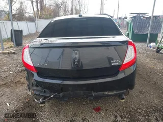 2013 Lincoln MKS with VIN 1LNHL9EK3DG616227, listed as a IAAI auction lot 40954777 with 85,810 mi miles. Bid and sale history available at carsss.com. Image 17.
