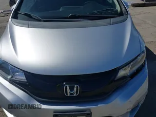 2015 Honda Fit LX z VIN 3HGGK5H51FM750102, wystawiony jako IAAI lot #42278830 z przebiegiem 121 855 mil mil oraz . Historia ofert i sprzedaży dostępna na DreamBid. Obrazek 10.