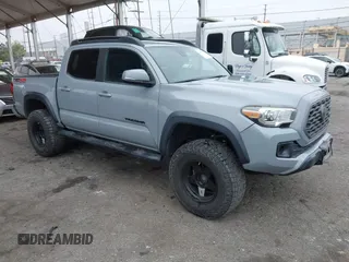 2019 Toyota Tacoma SR z VIN 3TMCZ5AN6KM235755, wystawiony jako IAAI lot #41998041 z przebiegiem 66 202 mil mil oraz . Historia ofert i sprzedaży dostępna na DreamBid. Obrazek 1.