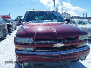2004 Chevrolet Suburban Z71 with VIN 3GNFK16Z84G231091, listed as a IAAI auction lot 41595885 with 101,243 mi miles. Bid and sale history available at carsss.com. Image 12.