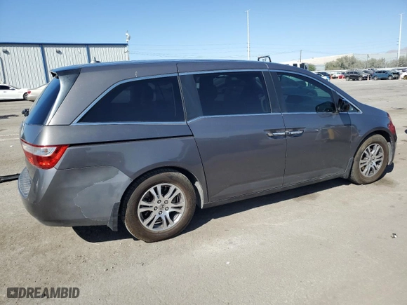 2012 Honda Odyssey EX-L with VIN 5FNRL5H64CB048921, listed as a Copart auction lot 75468174 with 193,924 mi miles and Salvage Title. Bid and sale history available at carsss.com. Image 3.