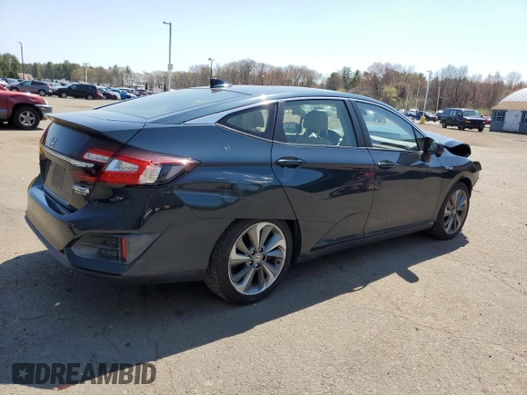 2018 Honda Clarity Touring with VIN JHMZC5F34JC015578, listed as a Copart auction lot 54193505 with 92,510 mi miles and Salvage Title. Bid and sale history available at DreamBid. Image 3.
