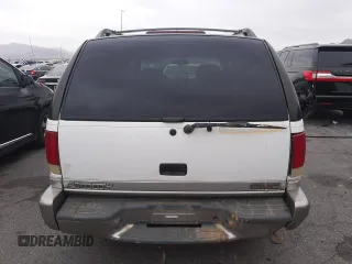 1999 GMC Jimmy SLE with VIN 1GKDT13W1X2551085, listed as a Copart auction lot 50553055 with 189,974 mi miles and Salvage Title. Bid and sale history available at carsss.com. Image 6.
