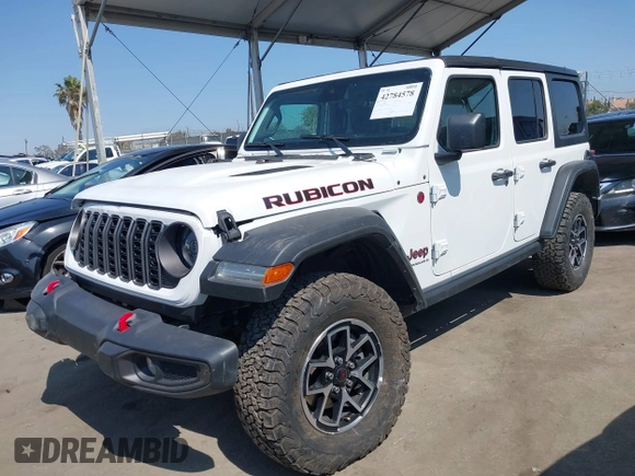 2024 Jeep Wrangler Rubicon with VIN 1C4PJXFG1RW300794, listed as a IAAI auction lot 42784578 with 22,652 mi miles and . Bid and sale history available at DreamBid. Image 2.