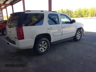 2007 GMC Yukon SLT z VIN 1GKFK13027J332987, wystawiony jako IAAI lot #42265048 z przebiegiem 206 293 mil mil oraz . Historia ofert i sprzedaży dostępna na DreamBid. Obrazek 4.