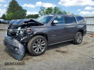 2015 Chevrolet Tahoe LTZ with VIN 1GNSKCKC9FR698924, listed as a Copart auction lot 56196895 with 184,740 mi miles and Salvage title. Bid and sale history available at DreamBid. Image 1.
