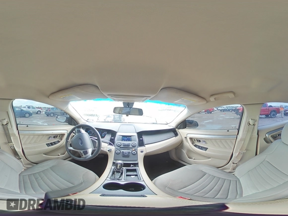 2014 Ford Taurus SE z VIN 1FAHP2D86EG143517, wystawiony jako Copart lot #51066975 z przebiegiem 134 892 mil mil oraz Szkoda całkowita • Salvage title. Historia ofert i sprzedaży dostępna na DreamBid. Obrazek 13.