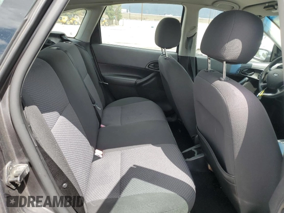 2006 Ford Focus S z VIN 1FAFP37N76W182882, wystawiony jako Copart lot #56939295 z przebiegiem 136 831 mil mil oraz Szkoda całkowita • Salvage title. Historia ofert i sprzedaży dostępna na DreamBid. Obrazek 10.
