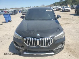 2021 BMW X1 xDrive28i z VIN WBXJG9C07M5S73464, wystawiony jako Copart lot #50374525 z przebiegiem 117 828 mil mil oraz Tytuł czysty. Historia ofert i sprzedaży dostępna na DreamBid. Obrazek 5.