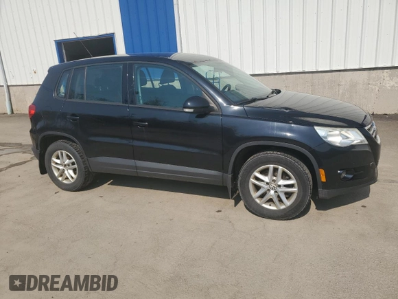 2011 Volkswagen Tiguan with VIN WVGCV7AX8BW511387, listed as a Copart auction lot 57284625 with 284,102 mi miles and Salvage title. Bid and sale history available at DreamBid. Image 4.