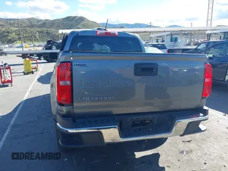2021 Chevrolet Colorado 2WD Work Truck z VIN 1GCGSBEA5M1130412, wystawiony jako IAAI lot #41935021 z przebiegiem 56 475 mil mil oraz . Historia ofert i sprzedaży dostępna na DreamBid. Obrazek 16.
