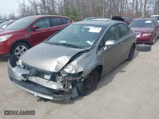 2007 Honda Civic Sdn EX with VIN 1HGFA16897L074604, listed as a IAAI auction lot 41695508 with 148,325 mi miles. Bid and sale history available at carsss.com. Image 2.