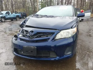 2012 Toyota Corolla L with VIN 2T1BU4EE5CC875318, listed as a IAAI auction lot 41962101 with 125,078 mi miles. Bid and sale history available at carsss.com. Image 12.