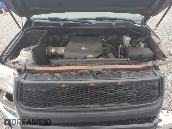 2017 Toyota Tundra Platinum with VIN 5TFAY5F10HX606671, listed as a Copart auction lot 58324935 with 137,112 mi miles and Salvage title. Bid and sale history available at DreamBid. Image 11.