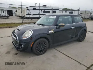 2014 MINI Hardtop S with VIN WMWXM7C57ET987069, listed as a Copart auction lot 52147955 with 121,276 mi miles and Salvage Title. Bid and sale history available at DreamBid. Image 1.