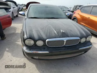 2006 Jaguar XJ with VIN SAJWA71BX6SH01193, listed as a Copart auction lot 76382034 with 0 mi miles and Salvage Title. Bid and sale history available at carsss.com. Image 5.