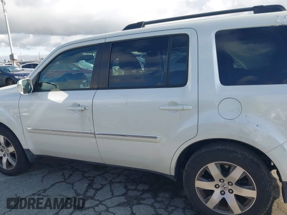 2015 Honda Pilot Touring with VIN 5FNYF3H93FB007766, listed as a IAAI auction lot 41932052 with 131,036 mi miles. Bid and sale history available at carsss.com. Image 14.
