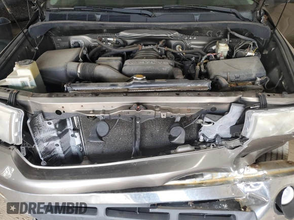 2009 Toyota Tundra z VIN 5TFBT54129X015491, wystawiony jako Copart lot #50884015 z przebiegiem 142 533 mil mil oraz Szkody całkowita. Historia ofert i sprzedaży dostępna na DreamBid. Obrazek 13.