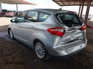 2015 Ford C-Max SEL with VIN 1FADP5BU6FL114222, listed as a IAAI auction lot 41956010 with 149,023 mi miles. Bid and sale history available at carsss.com. Image 3.
