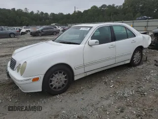 2000 Mercedes-Benz E-Class with VIN WDBJF70J1YB078418, listed as a Copart auction lot 71177244 with 189,838 mi miles and Salvage Title. Bid and sale history available at carsss.com. Image 1.