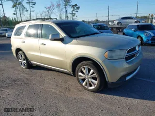 2012 Dodge Durango Crew with VIN 1C4SDHDT5CC204912, listed as a IAAI auction lot 41607315 with 209,985 mi miles. Bid and sale history available at carsss.com. Image 1.