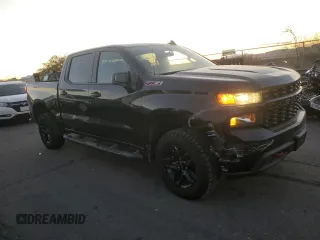 2021 Chevrolet Silverado 1500 Custom Trail Boss with VIN 3GCPYCEF6MG104130, listed as a Copart auction lot 82775624 with 62,408 mi miles and Salvage Title. Bid and sale history available at DreamBid. Image 4.