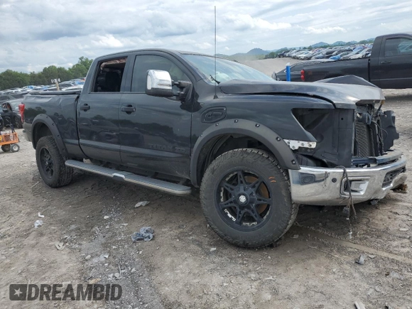2016 Nissan Titan SL z VIN 1N6BA1F22GN504550, wystawiony jako Copart lot #56616955 z przebiegiem 176 020 mil mil oraz Szkoda całkowita • Salvage title. Historia ofert i sprzedaży dostępna na DreamBid. Obrazek 4.