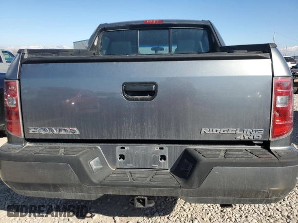 2009 Honda Ridgeline RT z VIN 5FPYK16259B104131, wystawiony jako Copart lot #46912055 z przebiegiem 75 116 mil mil oraz Szkoda całkowita • Salvage title. Historia ofert i sprzedaży dostępna na DreamBid. Obrazek 6.