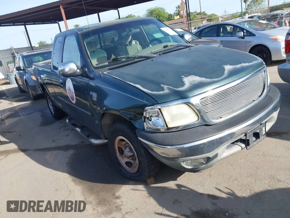 2002 Ford F-150 XL with VIN 1FTRX17L42NA52360, listed as a IAAI auction lot 41886697 with 121,346 mi miles. Bid and sale history available at carsss.com. Image 1.