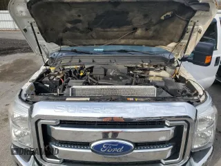 2012 Ford F-250 XL z VIN 1FTBF2B63CEA19489, wystawiony jako Copart lot #50071255 z przebiegiem 124 268 mil mil oraz Szkoda całkowita • Salvage title. Historia ofert i sprzedaży dostępna na DreamBid. Obrazek 11.