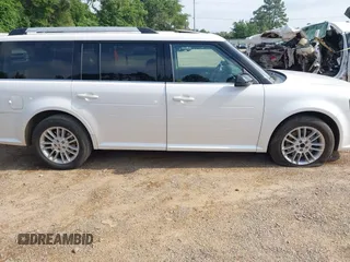 2014 Ford Flex SEL z VIN 2FMGK5C8XEBD00203, wystawiony jako IAAI lot #42304671 z przebiegiem 109 639 mil mil oraz . Historia ofert i sprzedaży dostępna na DreamBid. Obrazek 13.