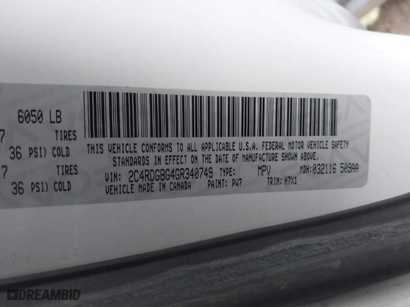 2016 Dodge Grand Caravan Canada Value Package with VIN 2C4RDGBG4GR340749, listed as a IAAI auction lot 41722101 with 156,948 mi miles. Bid and sale history available at carsss.com. Image 9.