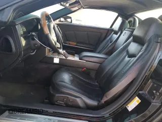 2009 Cadillac XLR Platinum z VIN 1G6YV36A395600052, wystawiony jako Copart lot #76961534 z przebiegiem 176 354 mil mil oraz Szkody całkowita. Historia ofert i sprzedaży dostępna na DreamBid. Obrazek 7.