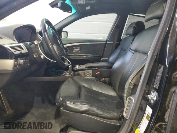 2007 BMW 7 Series 750i with VIN WBAHL83527DT89112, listed as a Copart auction lot 52806635 with 174,758 mi miles and Salvage title. Bid and sale history available at DreamBid. Image 7.